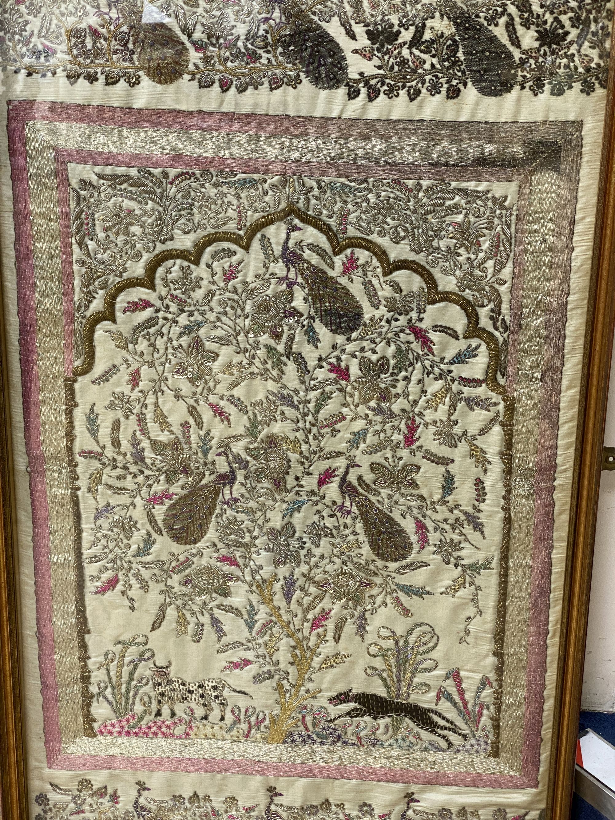 An Indian metal thread and sequin embroidered panel, 97 x 56cm, framed